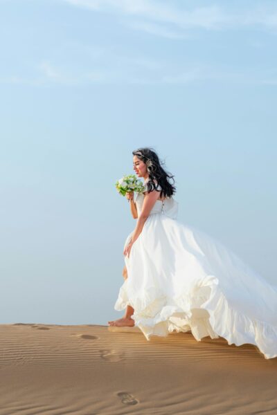 Bride Walking on Dune